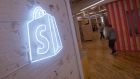 The logo of Shopify Inc. hangs on a wall at the company's office in Toronto, Ontario, March 13, 2015