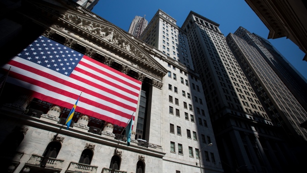 An American flag is displayed outside the New York Stock Exchange (NYSE) in New York, July 2, 2018