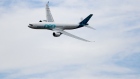 An Airbus SE A330-900 aircraft flies during the flying display on the opening day of the FIA