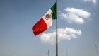 A Mexican flag flies outside the National Palace building in Mexico City, Mexico, on Friday, Feb. 16