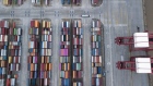 Containers sit stacked at the Yangshan Deep Water Port in this aerial photograph taken in Shanghai