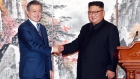South Korean President Moon Jae-in, left, and North Korean leader Kim Jong Un