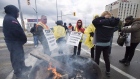 Striking Canada Post workers walk the picket line in Mississauga, Ontario, October 23, 2018