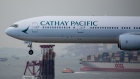 A Cathay Pacific Airways Ltd. aircraft prepares to land at Hong Kong International Airport in Hong Kong, China, on Sunday, Aug. 5, 2018. Just when Hong Kong’s flagship airline was showing signs of a rebound, crude oil played spoilsport again, denting early gains from a transformation plan that Chief Executive Officer Rupert Hogg considers crucial to survival. 