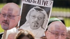 Codepink demonstrators hold photographs of journalist Jamal Khashoggi outside the White House in Washington, D.C., U.S., on Friday, Oct. 19, 2018. President Donald Trump told reporters Thursday that his administration is "waiting for the results of about three different investigations" as it decides how to respond amid reports that the U.S.-based journalist was ambushed inside the Saudi consulate in Istanbul, then tortured, killed and dismembered. 