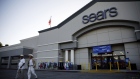 Shoppers exit a Sears Holdings Corp. store in Montebello, California. 