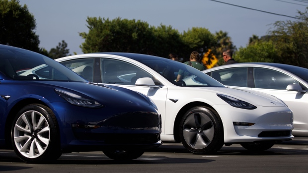 Tesla Inc. Model 3 electric vehicles sit at the company's delivery center in Marina Del Rey, California, U.S., on Saturday, Sept. 29, 2018. Tesla brought the total number of Model 3 produced in the third quarter to over 51,000 vehicles. 