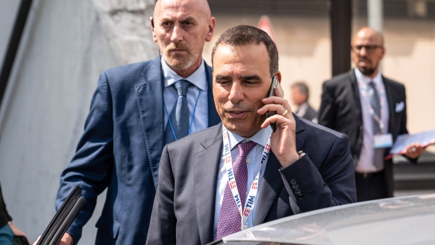 Amos Genish, chief executive officer of Telecom Italia SpA, speaks on a mobile phone as he leaves following an extraordinary shareholders' meeting at their headquarters in Rossano, Italy, on Friday, May 4, 2018. 