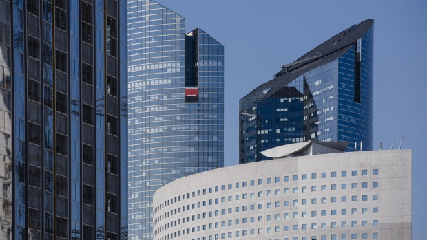 The headquarter skyscraper offices of Societe Generale SA, center, stand in La Defense business district of Paris, France, on Wednesday, April 19, 2017. 