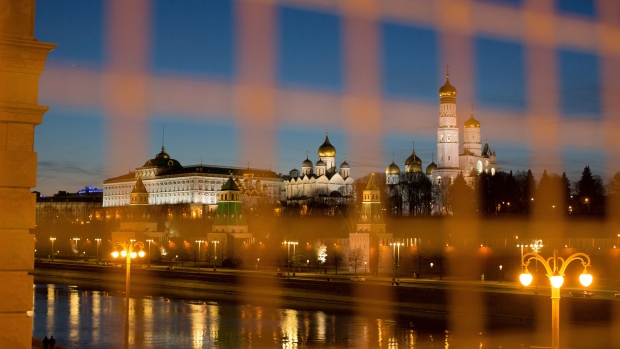 The buildings of the Kremlin complex sit beside the Moskva River in Moscow. 