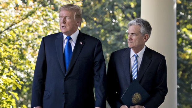U.S. President Donald Trump, left, and Jerome Powell, governor of the U.S. Federal Reserve and Trump's nominee as chairman of the Federal Reserve, walk out to a nomination announcement in the Rose Garden of the White House in Washington, D.C., U.S., on Thursday, Nov. 2, 2017.