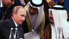 Salman bin Abdulaziz speaks with Vladimir Putin