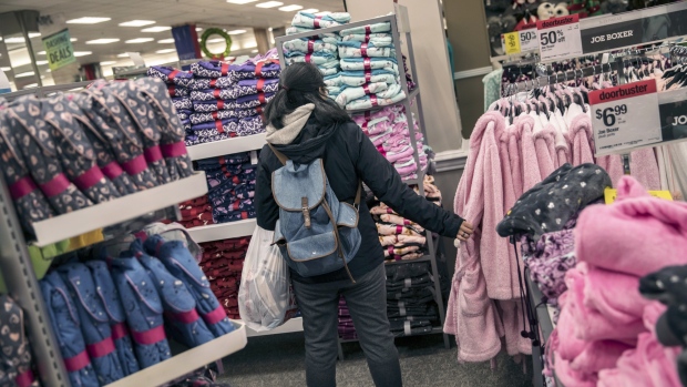 A shopper views robes in the sleepwear section of a Sears Holdings Corp. store on Black Friday at the Newport Centre Mall in Jersey City, New Jersey, U.S., on Friday, Nov. 23, 2018. With the U.S. economy strong, forecasts are signaling massive sales from Thanksgiving to Cyber Monday, and early signs say those rosy outlooks are spot on. 