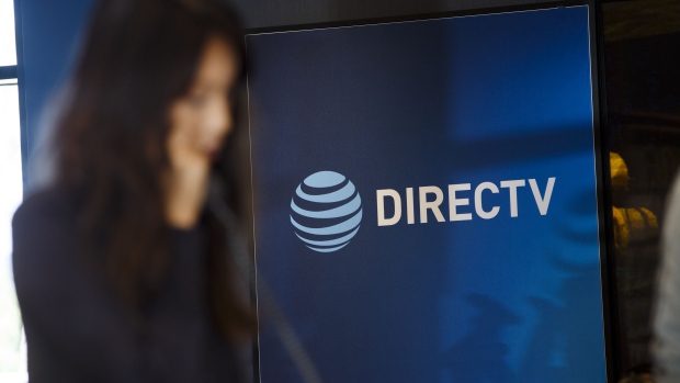 AT&T Inc. and DirecTV signage is displayed at a store in Newport Beach, California, U.S., on Thursday, Aug. 10, 2017. 