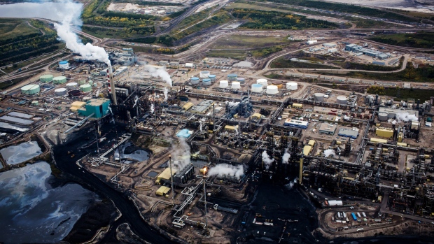 The Suncor Energy Inc. Millennium upgrader plant is seen in this aerial photograph taken above the Athabasca oil sands near Fort McMurray, Alberta, Canada, on Monday, Sept. 10, 2018. 