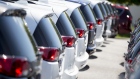 A row of Fiat Chrysler Automobiles (FCA) 2017 Crysler Pacifica minivan vehicles are displayed for sale at a car dealership in Moline, Illinois, U.S., on Saturday, July 1, 2017. 