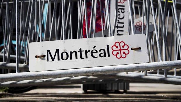 A "Montreal" sign is seen on barriers in Montreal, Quebec, Canada, on Monday, Aug. 20, 2018. Median single-family home prices in Montreal rose 5.7% to C$336,250 in July from a year ago, according to the Greater Montreal Real Estate Board (GMREB). 