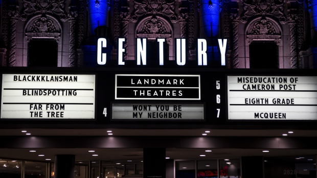 The titles of movies now playing are displayed on the marquee of the Landmark Century Centre Cinema in Chicago, Illinois, U.S., on Thursday, Aug. 16, 2018. Amazon.com Inc. is in the running to acquire Landmark Theaters, a move that would vault the e-commerce giant into the brick-and-mortar cinema industry, according to people familiar with the situation. 