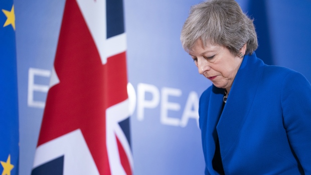 Theresa May, U.K. prime minister, departs after speaking following a special meeting of the European Council on the Brexit withdrawal agreement in Brussels, Belgium, on Sunday, Nov. 25, 2018.