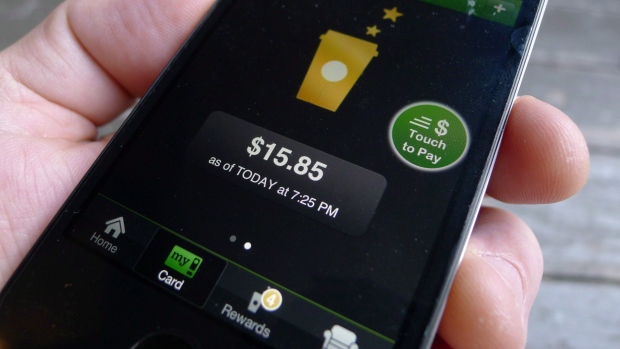 A Starbucks payment app is shown on a smartphone in Toronto, May 14, 2012