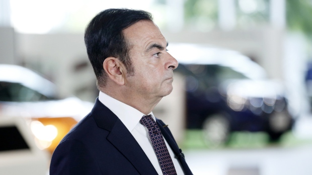Carlos Ghosn, chairman of the alliance between Renault SA, Nissan Motor Co. and Mitsubishi Motors Corp., pauses during a Bloomberg Television interview at the Paris Motor Show in Paris, France, on Tuesday, Oct. 2, 2018. The auto industry -- a slice of it at least -- converges in France this week for the biennial Paris Motor Show, where executives are showing off electric cars for the masses, robo-cars for the future and the self-proclaimed quickest car in the world. Photographer: Marlene Awaad/Bloomberg