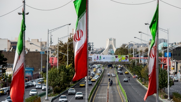 National flags of Iran fly above Azadi avenue in Tehran, Iran.in Tehran, Iran, on Saturday, Nov. 3, 2018. Iran’s Supreme Leader Ayatollah Khamenei said U.S. President Donald Trump’s policies are opposed by most governments and fresh sanctions on the Islamic Republic only serve to make it more productive and self-sufficient, the semi-official Iranian Students’ News Agency reported. 