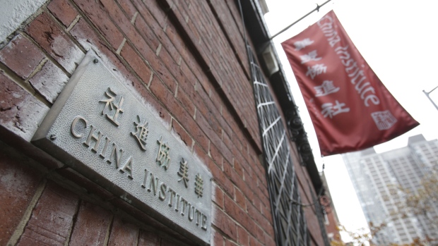 UNITED STATES - NOVEMBER 26: A plaque and a flag hang outside the China Institute, home of the Confucius Institute, at 125 E 65th Street in New York, U.S., on Monday, Nov. 26, 2007. The Chinese government's Office of the Chinese Language Council International, which has established 135 Confucius Institutes worldwide, is part of a broad campaign involving investment, aid and diplomacy as well as cultural outreach, all aimed at smoothing China's path to great-power status. (Photo by Daniel Acker/Bloomberg via Getty Images)