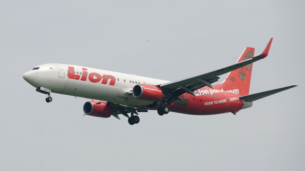 A Lion Air Group aircraft prepares to land at Soekarno-Hatta International Airport in Cengkareng