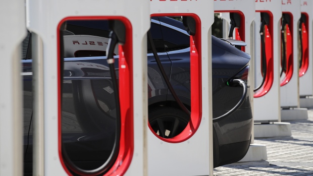 A Tesla Inc. Model S electric vehicle charges at a Supercharger stationn in Oftringen, Switzerland, on Thursday, Aug. 16, 2018. Tesla chief executive officer Elon Musk has captivated the financial world by blurting out via Twitter his vision of transforming Tesla into a private company. 