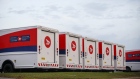 Canada Post Corp. mail delivery trucks sit in the Gateway Postal Facility parking lot Oct. 2018