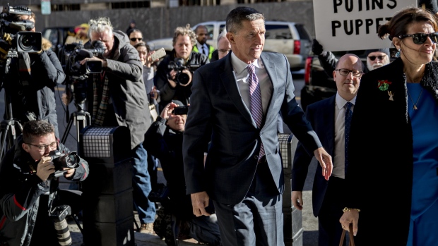 Michael Flynn, former U.S. national security adviser, center, arrives at federal court in Washington, D.C. on Dec. 18, 2018. 