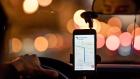 The Uber Technologies Inc. application is used for navigation on a smartphone during an Uber ride in Washington, D.C., U.S. 