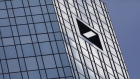 The Deutsche Bank AG logo sits on the bank's headquarters in Frankfurt, Germany, July 25, 2018