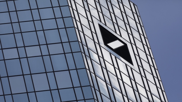 The Deutsche Bank AG logo sits on the bank's headquarters in Frankfurt, Germany, July 25, 2018