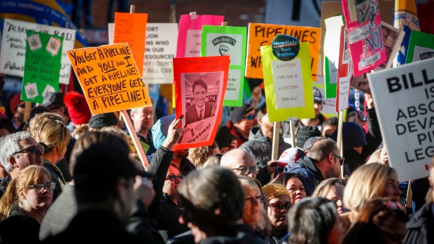 Protesters outside an event Prime Minister Justin Trudeau is attending in Calgary, Alta.