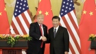 U.S. President Donald Trump, left, and Xi Jinping, China's president, shake hands during a news conference at the Great Hall of the People in Beijing, China, on Thursday, Nov. 9, 2017. 
