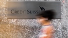 A pedestrian walks past the Credit Suisse Group AG headquarters in New York, U.S., on Wednesday, Sept. 19, 2018. Credit Suisse and UBS Group AG could manage a potential share sale of Stadler Rail AG as it explores a potential initial public offering. 