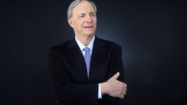 Raymond Dalio, billionaire and founder of Bridgewater Associates LP, poses for a photograph following a Bloomberg Television interview at the World Economic Forum (WEF) in Davos, Switzerland, on Thursday, Jan. 19, 2017. World leaders, influential executives, bankers and policy makers attend the 47th annual meeting of the World Economic Forum in Davos from Jan. 17 - 20. 