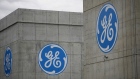 General Electric Co. (GE) logos are displayed on the outside of enclosed jet engine test tunnels at the GE Aviation Test Operations facility in Peebles, Ohio, U.S. 