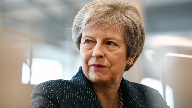 Theresa May, U.K. prime minister, pauses during a round-table discussion on the Race at Work charter in London, U.K.