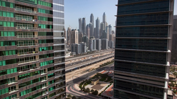 The skyline of Dubai Marina, center, sits beyond the Sheikh Zayed highway seen from the Jumeirah Lake Towers in Dubai, United Arab Emirates.
