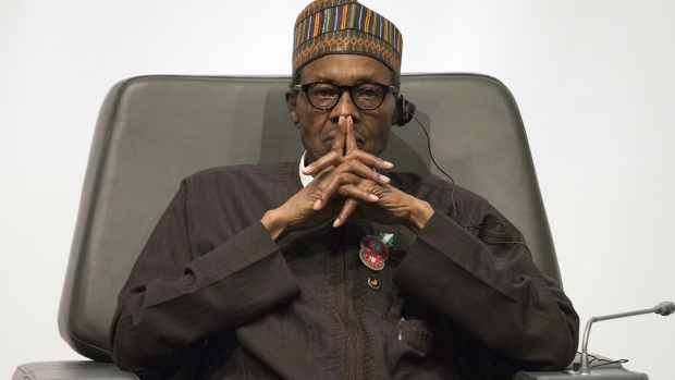 Muhammadu Buhari, Nigeria's president, pauses during the International Forum on Peace and Security In Africa, in Dakar, Senegal, on Tuesday, Dec. 6, 2016.  Photographer: Xaume Olleros/Bloomberg