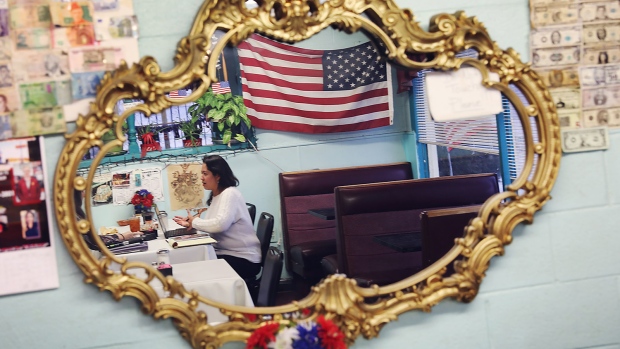 FORT HANCOCK, TX - JANUARY 14: Theresa Chavez is seen reflected in a mirror as she stops by Angie's Cafe on January 14, 2019 in Fort Hancock, Texas. The U.S. government is partially shutdown as President Donald Trump is asking for $5.7 billion to build additional walls along the U.S.-Mexico border and the Democrats oppose the idea. Ms. Chavez said "the money would be better spent on manpower and technology because people will always find a way to come over, around or through a wall." (Photo by Joe Raedle/Getty Images)