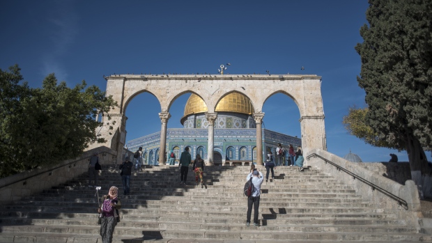 Visitors approach the entrance to the Dome of The Rock on Temple Mount in the Old City in Jerusalem, Israel. 