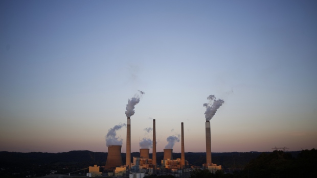 Emissions rise from the American Electric Power Co. (AEP) coal-fired John E. Amos Power Plant in Winfield, West Virginia, U.S.