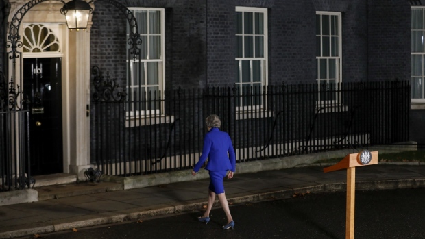 Theresa May, U.K. prime minister, delivers a speech, after winning a confidence vote in Parliament, outside number 10 Downing Street in London, U.K., on Wednesday, Jan. 16, 2019. 
