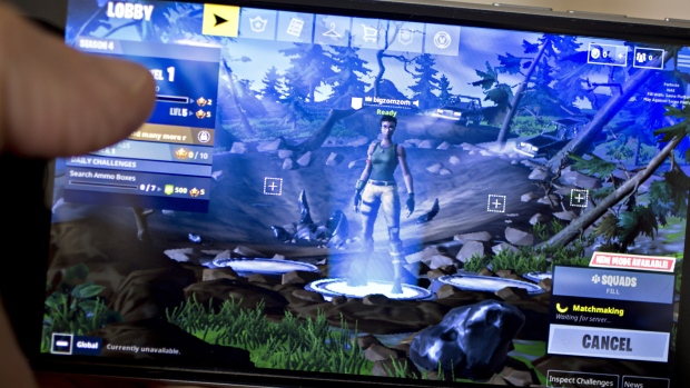 The Epic Games Inc. Fortnite: Battle Royale video game is displayed for a photograph on an Apple Inc. iPhone in Washington, D.C., U.S.