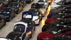 A line of new Tesla Model X sports utility vehicles (SUV), center, sit with Tesla Model S automobiles following assembly for the European market at the Tesla Motors Inc. factory in Tilburg, Netherlands. 