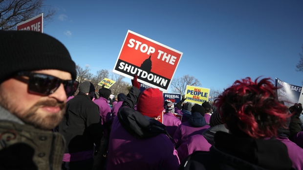 WASHINGTON, DC - JANUARY 10: People rally against the partial federal government shutdown outside the U.S. Capitol January 10, 2019 in Washington, DC. A stalemate continues between President Trump and congressional Democrats as they cannot come to a bipartisan solution for more money to build a wall along the U.S.-Mexico border. (Photo by Mark Wilson/Getty Images) 