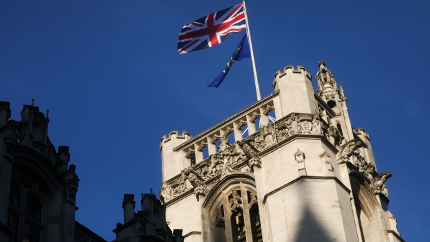 The Union Flag, also known as a Union Jack, flies above the Supreme Court in London, U.K., on Monday, Dec. 5, 2016. The U.K. Supreme Court is hearing the government's case against holding a vote in Parliament before beginning Britain's exit from the European Union. 